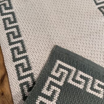 Tappeto Greca verde e avorio reversibile con motivo geometrico